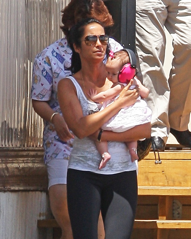 Padma Lakshmi white tank, black yoga pants, sunglasses, 